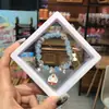 Libro Caperucita Roja Mismo Estilo Estudiante Pulsera de Glaseado de Palomitas de Maíz Hecha a Mano con Cuentas Dibujos Animados Cristal Pulsera Infantil Venta al por Mayor Cajas de Regalo