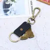 Llavero de Cuero de Bota Vintage, Colgante de Llave de Cuero con Hebilla de Latón Antiguo, Accesorios Unisex al por Mayor