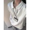 Sudadera de color liso estilo americano minimalista, corte limpio, con apariencia de dos piezas, cuello polo, de peso pesado, manga larga para hombre, con un toque de alta gama.
