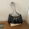 Bolsa de ombro feminina casual e moderna, nova coleção outono 2026, apresentando um design único, estilo minimalista e bolsa de axila fashion