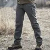 2026 Marca Independiente Verano Hombres Nuevo Deportivo Moderno Color Sólido Pantalones de Chándal Cargo Casual Versátil Pantalones Largos en Stock