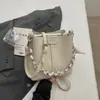 Bolsa de Mão Balde para o Dia a Dia Mulheres 2026 Verão Design de Nicho Nova Bolsa de Ombro Único Bolsa Transversal Simples para o Dia a Dia