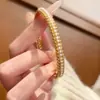 Tienda de Oro Mismo Estilo Arena Dorada Wanrong Broche Pulsera Estilo Antiguo Filigrana Herencia Pulsera de Perlas de Imitación Tendencia China Nuevo Estilo Chino Pulsera