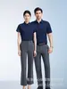 Camisas Grises con Logo Personalizado para Hombre y Mujer Primavera/Verano 2026 Sin Planchar Ligeramente Elásticas Camisas Profesionales Venta de Negocios Ropa de Trabajo