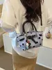 Bolsa de Mano Cruzada de Hombro Estilo Perezoso de Gran Capacidad con Lunares Elegante Simple Casual Verano 2026 Nuevo Estilo