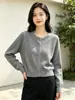 Chaqueta cárdigan de punto de tres hilos de terciopelo Andy engrosada que reduce la edad, con bloques de color, para mujer, nuevo suéter de otoño e invierno 2026