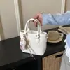 Bolsa de Mão Tendência e Popular de Nicho para Mulheres, Novo Estilo Primavera/Verão 2026, Bolsa de Ombro Versátil em Patchwork, Bolsa Saco de Alta Qualidade