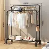 Simple perchero de pie para uso doméstico en el dormitorio, perchero elevado, perchero interior desmontable y extensible