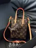 Elegante bolsa de mão pequena estilo vintage para mulheres 2026 novo modelo bolsa de telefone com estampa retrô bolsa de ombro versátil para mulheres bolsa transversal