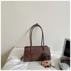 2026 Verano Nueva Moda Bolso de Hombro para Mujer Color Sólido Único Estilo Fresco Bolso de Mano de Moda Nicho de Alto Valor