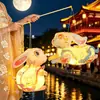 Festival do Meio Outono Coelho de Jade Lanterna Artesanal DIY 2026 Novo Modelo Infantil de Jardim de Infância Lanterna de Coelho Brilhante Portátil