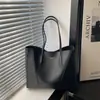 Bolsa de Grande Capacidade para Mulheres 2026 Primavera Novo Estilo Bolsa de Ombro Simples Popular Este Ano para Trabalho e Deslocamento Bolsa Tote de Cor Sólida