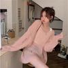 Blusa Sexy Transparente Nueva Otoño e Invierno Europeo y Americano 2025 Punto Holgado con Cortes Hombros Descubiertos Punto Versátil Reductor de Edad para Mujer