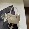 Bolso de Mano Único de Alto Estilo Nuevo para Verano 2026, Bolso de Hombro de Moda, Bolso Cubo Casual Relajado de Color Sólido, Moderno