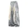 Nuevos pantalones casuales estampados de salpicaduras de tinta para otoño e invierno para hombre, holgados y versátiles, pantalones casuales de moda estilo americano, pantalones de pierna ancha de estilo relajado para hombre