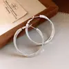 Aretes colgantes redondos de tres capas trenzadas con pasador de plata, aretes simples y elegantes, lujo ligero con un toque de alta gama, diseño único y de nicho