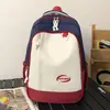Nueva mochila de color block estilo universitario transfronteriza, bolsa escolar de gran capacidad para estudiantes de secundaria y preparatoria, mochila ligera casual para viajes