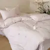 Juego de ropa de cama de algodón de cuatro piezas inspirado en princesas al estilo francés con bordado completo y delicados detalles de encaje, funda de edredón bordada dulce