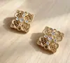 Nuevos colgantes de joyería estilo chino, accesorios de cobre fundido, accesorios para el cabello DIY, collares, piezas de colgante de flor con patrón de nube hueca tradicional