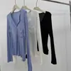 Camiseta protetora solar leve, semi-transparente, com gola estilo Henry americana oxigenada, em mistura de Lyocell e seda, manga longa casual