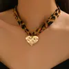 Collar con Corazón Estampado de Leopardo al por Mayor Joyería de Nicho Transfronteriza Europea y Americana Tendencia Estilo Hip-Hop Cadena Corta con Estrella y Corazón de Melocotón