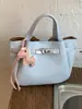 Bolso Pequeño Retro de Gama Alta para Mujer 2026 Nueva Moda Versátil Bolso Cruzado Exquisito Súper Popular Bolso de Mano Bolso Cubo
