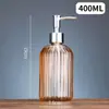 Botella de vidrio de color para desinfectante de manos con emulsión tipo dispensador de presión botella de jabón champú gel de ducha rellenables