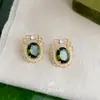 Pendientes de Flor Geométrica Verde Oliva Estilo Bosque Dulce Micro-Pavimentados con Circonita, Pendientes Nuevos Populares Elegantes y Simples para Mujer
