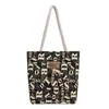 Bolsas 2025 Nueva Bolsa Tote de Lona de Gran Capacidad para Estudiantes Bolso Tote de Hombro con Estampado de Moda Transfronterizo para Mujeres Bolsas