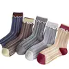 Calcetines retro cálidos de punto con volantes hasta la mitad de la pantorrilla para primavera, otoño e invierno, estilo coreano, con bloques de color a rayas de moda, dulces y lindos, versátiles para hombres y mujeres