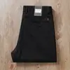 Estación Europea Otoño e Invierno Gruesos Sueltos Cómodos Modal Algodón de Fibra Larga Mezclado Hombres Elásticos Rectos Pantalones Casuales de Negocios