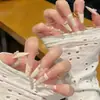 Parches para Manicura de Uñas Portátiles al por Mayor Hielo Transparente Puro Lust Camelia Mariposa Pegatinas de Uñas Terminadas Uñas Postizas Removibles