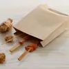 Bolsa de papel acanalado en blanco al por mayor de fábrica Película Kraft bolsa para empaque de snacks anti-aceite stock general bolsa para empaque de alimentos