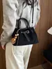 Bolso de diseño único para mujer, nuevo bolso cubo retro estilo coreano de ante, elegante bolso de hombro y bolso cruzado