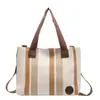 Bolsa de lona transfronteriza, gran capacidad, bolsa simple de rayas estilo coreano para el día a día, bolso de hombro para mujer, bolso tote moderno y versátil