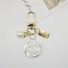 Llavero Colgante para Bolso Perla de Concha en Forma de Corazón Estilo Ins Joyería de Metal DIY Fabricante de Caracolas