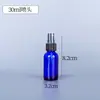 Botella rociadora de vidrio oscuro azul botella con dispensador de loción botella de esencia botella cuentagotas botella de cosméticos botella de perfume al por mayor