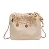 Bolso de Cubo Acolchado de Cadena de Gama Alta para Mujer 2026 Nuevo Estilo de Commuter de Nicho Bolso de Hombro Cruzado de Moda