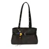 Bolso de hombro de gran capacidad, elegante, con diseño minimalista, aire retro y atractivo casual. Presenta una correa de cuero plisada y un asa de mano, lo que la convierte en un bolso versátil para mujer.