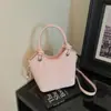 Bolso de mano estilo coreano para mujer, nuevo modelo principios de otoño 2026, bolso de cubo con estampado de leopardo de alta costura, nicho, para hombro