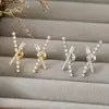 Pendientes Luochen de Diamante Completo con Letra X y Circonita Estilo Europeo y Americano Diseño de Nicho Pendientes de Lujo Exquisitos y Accesibles Pendientes