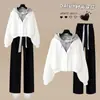 Versátil conjunto de moda estilo coreano estilo universitario chaqueta con capucha de dos piezas falsas y pantalones casuales de pierna recta para primavera y otoño