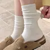 Calcetines holgados versátiles sin costuras para mujer, estilo coreano otoño e invierno para estudiantes, calcetines de media pantorrilla color blanco lechoso, calcetines largos de algodón de color liso para adolescentes