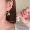Pendientes de flores de colores súper hadas 2024, nuevos pendientes de verano para mujer, pendientes de nicho, pendientes ligeros de lujo de alta gama, venta al por mayor