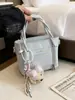 Bolso de Cubo Portátil Exquisito Versátil Estilo Coreano para Mujer 2026 Nuevo Simple Personalidad Casual Bolso de Hombro Cruzado