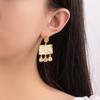Pendientes de plata 925 con borlas de diamantes y circonitas bañadas en oro con textura de latón retro de estilo nicho europeo y americano.