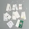 Venda quente de fábrica etiqueta etiqueta de desenho animado personalizada etiqueta de roupa etiqueta de roupa personalizada logo criativo Acessórios Atacado