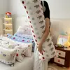 Almohada larga de terciopelo de leche con estampado de dibujos animados estilo Ins, adecuada para camas de dormitorio, previene golpes y se puede usar como almohada para dormir de lado; el núcleo de la almohada es extraíble y lavable