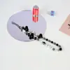Venta al por mayor del fabricante Nuevo modelo Gato Kt Lazo Cadena para teléfono Colgante de cadena para teléfono con cuentas hecho a mano Decoración para niñas