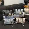 Bolso Exquisito Versátil Transfronterizo para Viajes Diarios 2026 Verano Nuevo Diseño de Nicho Moda de Gama Alta Bolso Pequeño Cuadrado de Hombro Cruzado